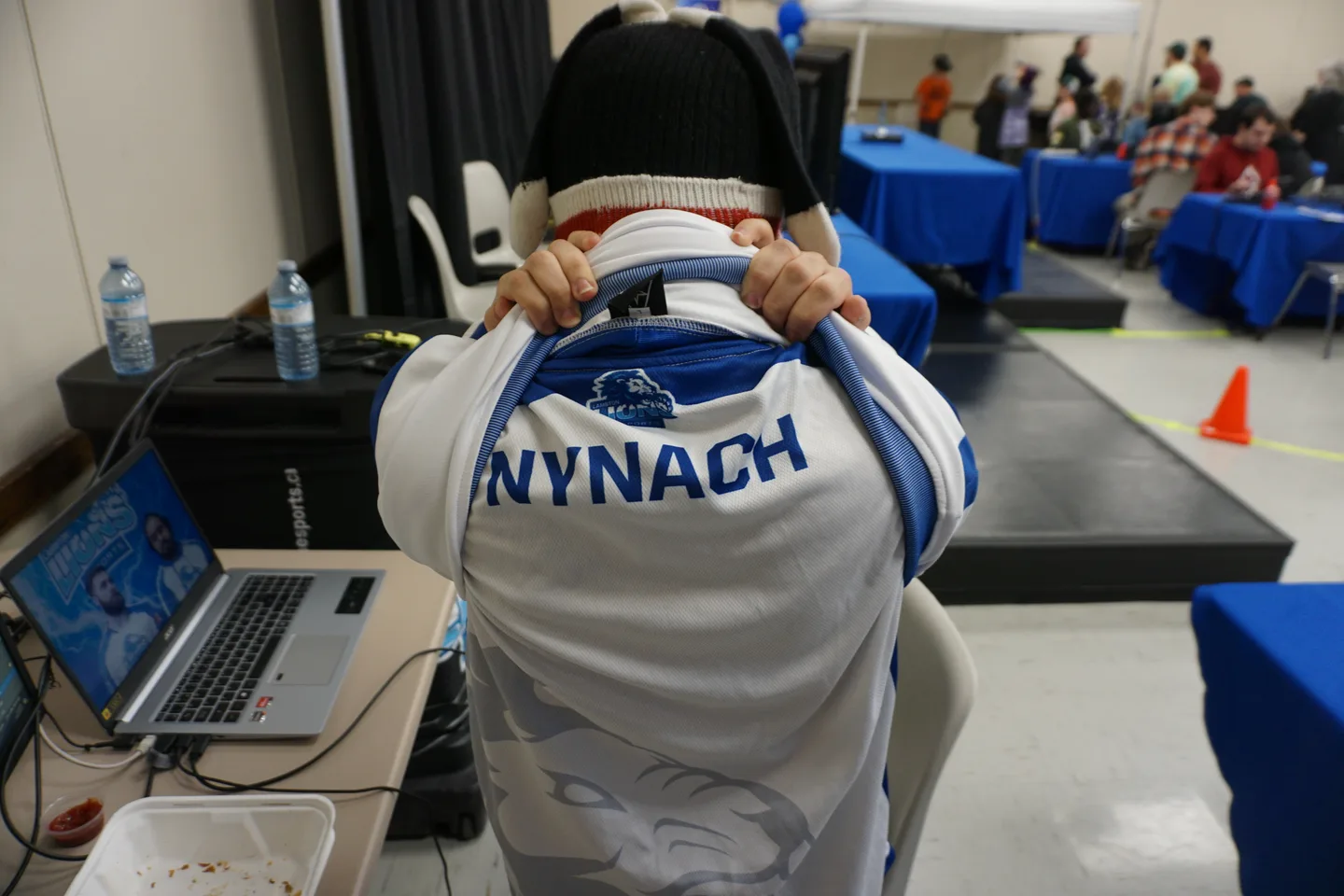 The back of my Lambton Lions jersey, with NYNACH across the shoulders, at an esports event.